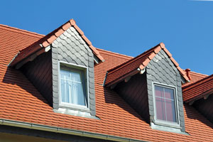 Schieferverkleidungen von Dachgauben und Fassaden in Lübeck durch Dachdeckerei Senger